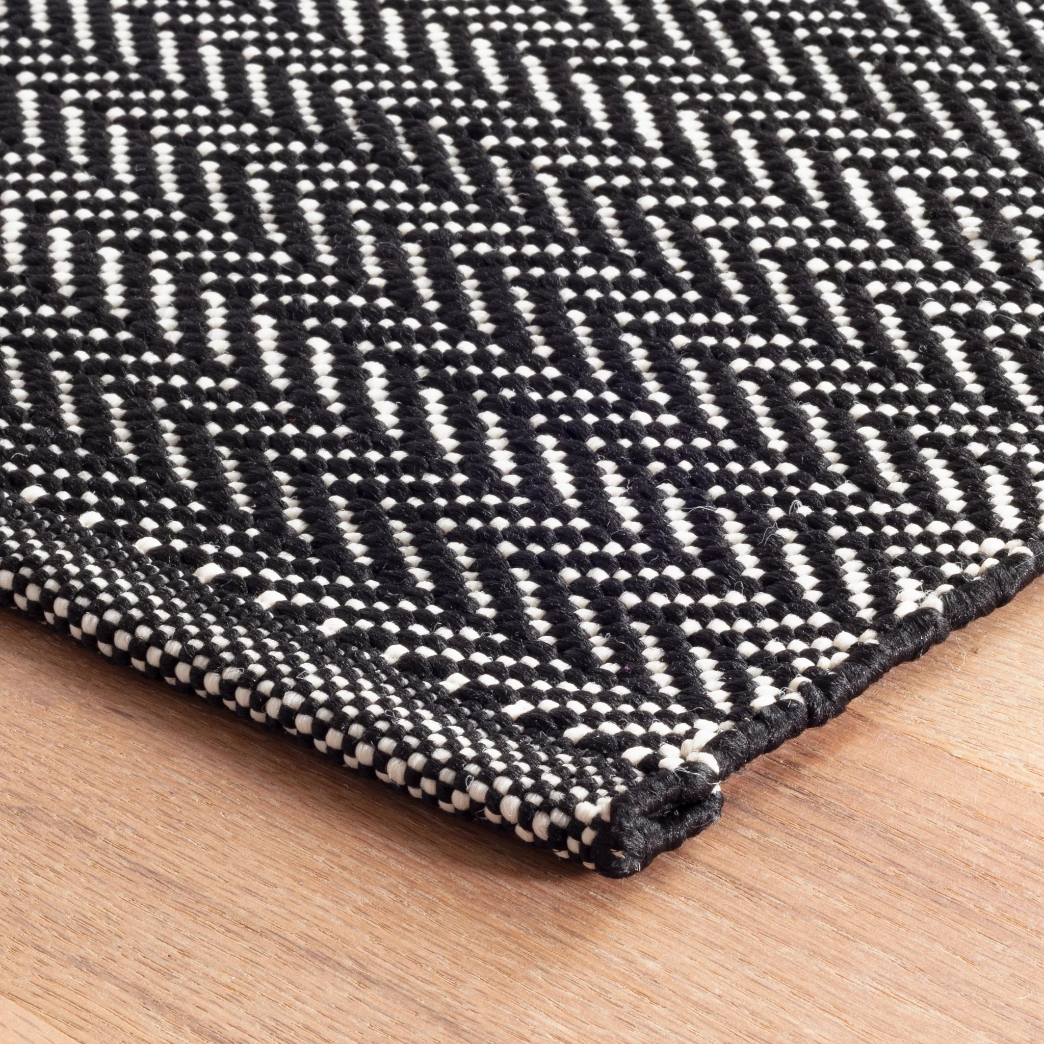 Herringbone Black/Ivory Handwoven Indoor/Outdoor Rug - Image 3